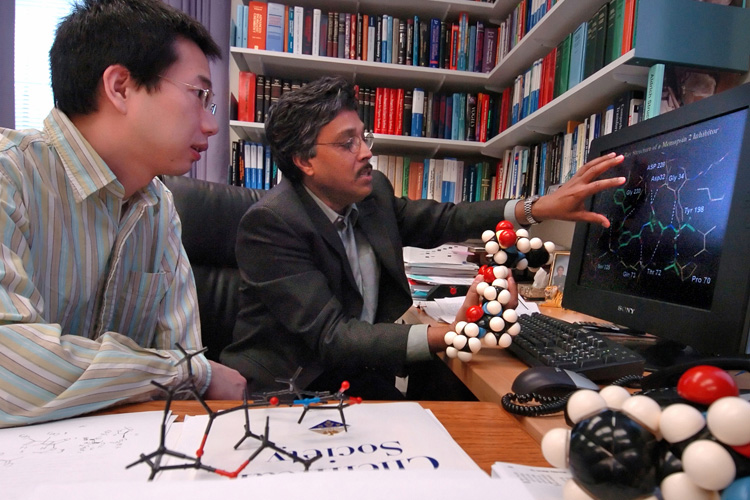  Professor Arun Ghosh and his student.