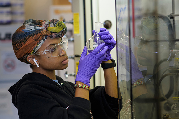 Female student in lab.