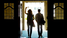 Two students exiting the Purdue Memorial Union.