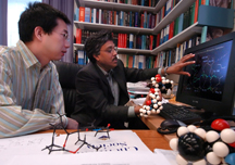 Arun Ghosh, at right, and Xiaoming Xu