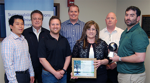 Group photo celebrating 2016 lab glove recycling award