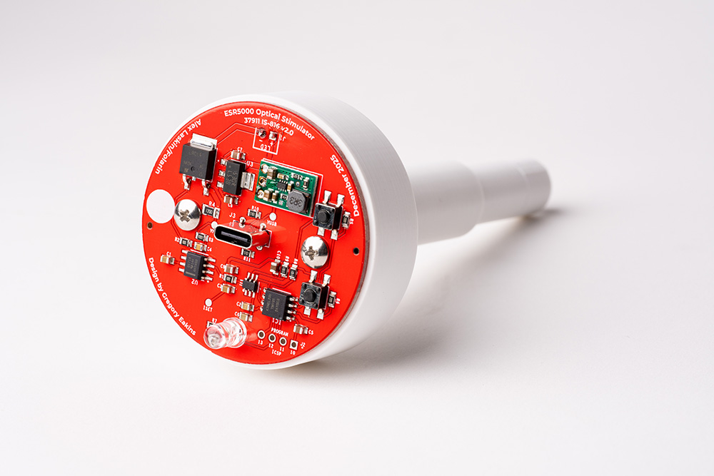 A photo of the circuitry inside of the optical stimulator. This design features a USB-C input connector for power, and ATTiny85 microcontroller for control, and a Digital to Analog converter for precision current control.