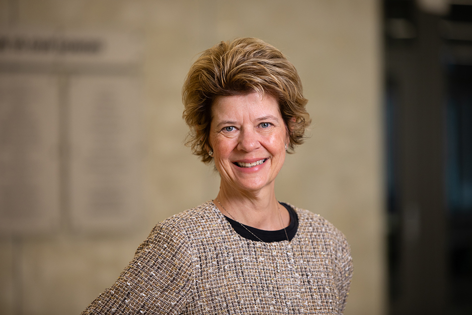 Marcy Towns poses against a neutral backdrop.