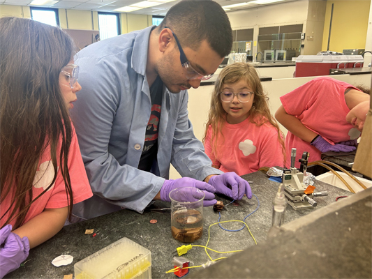 Girl Scouts make battery using pennies