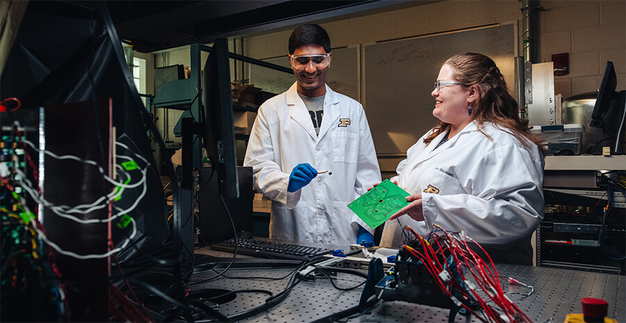 postdocs working in laser lab